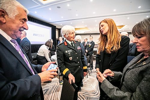 MIKAELA MACKENZIE / FREE PRESS
Chief of the Defence staff general Jennie Carignan chats with Peerless designer Shelley Ediger at a Winnipeg Chamber of Commerce luncheon at the Fairmont Hotel on Wednesday, March 25, 2026.
For Aaron story
Free Press 2026