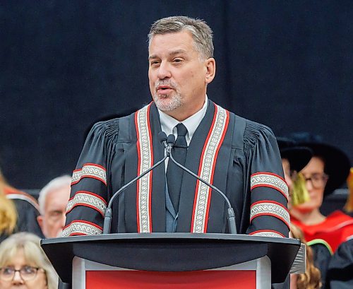 MIKE DEAL / FREE PRESS
Dr. Todd Mondor, President and Vice-Chancellor, University of Winnipeg, speaks during the ceremony.
Graduates along with friends and family attend the University of Winnipeg’s 127th fall Convocation at Duckworth Centre Friday morning. 
Along with celebrating the work of students, staff and faculty the University bestowed an honourary doctorate on Scott Oake.
Standup
251017 - Friday, October 17, 2025.