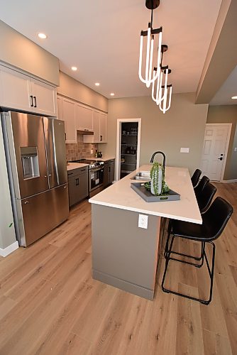 Todd Lewys / Free Press
A chef’s dream, the island kitchen is filled with functionality, style and a subtle elegance.