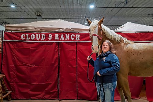 Tara Reimer stands with her horse Paris as they prepare for Tuesday’s jumper competition at the Keystone Centre in Brandon. On Tuesday, March 31 (Weichen Zhang / The Brandon Sun)