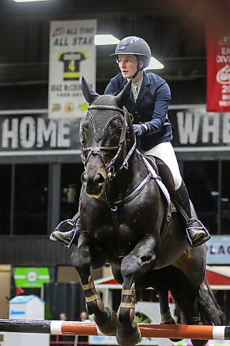 Brookdale's Abbey McLeod competes in the Wawanesa Accumulator show jumping competition at the Royal Manitoba Winter Fair on Monday. (Thomas Friesen/The Brandon Sun)