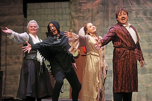Marilyn Hardy, Mitch Wedgewood, Shayna Wakefield and Clint McLachlan, in character as Frau Blücher, Igor, Inga and Dr. Frederick Frankenstein, perform in the dress rehearsal for "Young Frankenstein" on Wednesday. (Tim Smith/The Brandon Sun)
