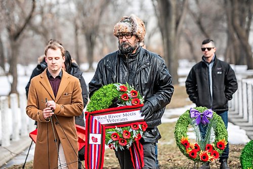 MIKAELA MACKENZIE / FREE PRESS
	
MMF minister of veterans Shawn Nault lays a wreath at the rededication ceremony of the Bank of Montrealճ World War I memorial statue at Brookside Cemeteryճ Field of Honour on Thursday, April 9, 2026.

For Scott Billeck story.
Free Press 2026