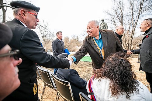 MIKAELA MACKENZIE / FREE PRESS
	
MMF president David Chartrand (right) shakes hands with Ken Minty at the rededication ceremony of the Bank of Montrealճ World War I memorial statue at Brookside Cemeteryճ Field of Honour on Thursday, April 9, 2026.

For Scott Billeck story.
Free Press 2026