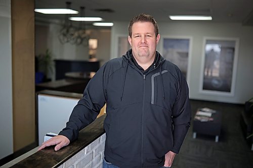 Evan Keller, president of Keller Developments, at the company's office on Middleton Avenue in Brandon on Friday. Keller said the proposed new development charges, on top of increased property taxes and Canada Mortgage and Housing Corporation premiums, are making the local housing market “very unattractive.” (Tim Smith/The Brandon Sun)