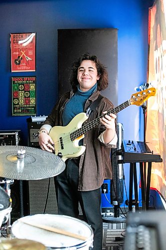 MIKAELA MACKENZIE / FREE PRESS
	
Theo Shalley, teacher at the School of Rock, on Thursday, April 9, 2026. The music school is turning ten this year.

For AV story.
Free Press 2026