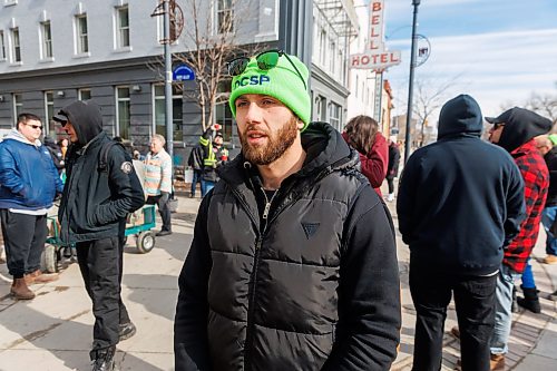 MIKE DEAL / FREE PRESS
Jayden Friesen, a Clean Slate program mentor with Downtown Community Safety Partnership (DCSP) during a patrol with the volunteers of the Main Street Community Walk on Main Street Thursday.
Reporter: Nicole Buffie
260409 - Thursday, April 09, 2026.