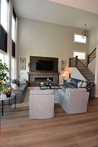 Todd Lewys / Free Press
A 20-foot-high ceiling combines with floor-to-ceiling windows and a gorgeous staircase to make for a subtly spectacular great room.