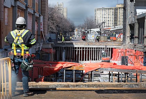 Ruth Bonneville  Free Press

Local Standup - Portage Place Dev

Work crews radically transform what used to be the centre court with clock tower of Portage Place  on Portage Ave. at Edmonton Street Tuesday.  

View through fencing on Portage at Edmonton. 

April 14th,  2026
