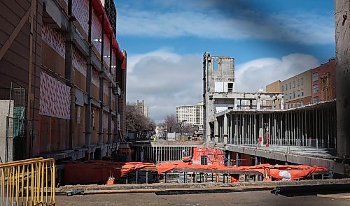 Ruth Bonneville  Free Press

Local Standup - Portage Place Dev

Work crews radically transform what used to be the centre court with clock tower of Portage Place  on Portage Ave. at Edmonton Street Tuesday.  

View through fencing on Portage at Edmonton. 

April 14th,  2026
