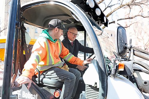 Ruth Bonneville  Free Press

LOCAL STDUP - clean-up launch

Mayor Scott Gillingham is all smiles  as he operates a Toolcat outfitted with a broom on front with the help of Blair Stewart with Neighborhood Action Team, in the cab with him at the end of the spring clean-up launch in Old Market Square Wednesday. 

Downtown beautification blitz and citywide spring clean-up launch in Old Market Square in the Exchange District, with Mayor Scott Gillingham, Wednesday.

April 15th,  2026
