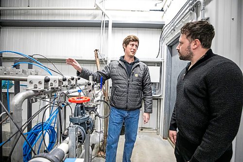 MIKAELA MACKENZIE / FREE PRESS
	
Tanner Devlin, process engineer at Nexom, gives a site overview of the new technology to Dave Harrison, RM of St. Paul utility supervisor, at at the East St. Paul Wastewater Treatment Facility on Thursday, April 16, 2026.

For Aaron story.
Free Press 2026