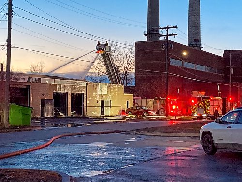 DAVID FULLER / FREE PRESS
Firefighters spray water on a commercial building on Henry Avenue Friday morning.
At 2:36 a.m., the Winnipeg Fire Paramedic Service responded to reports of a structure fire in a commercial building in the 1000 block of Henry.
At the scene, crews found heavy flames and smoke coming from the building. Firefighters used a defensive strategy because it was unsafe to enter the building. The hazardous materials team responded because there were reports of chemicals in the building.
Firefighters deployed a drone, and crews used an aerial ladder to spray water on the fire. Firefighters declared the fire under control at 5:08 a.m.
No injuries were reported. The fire is under investigation.
260424 - Friday, April 24, 2026.