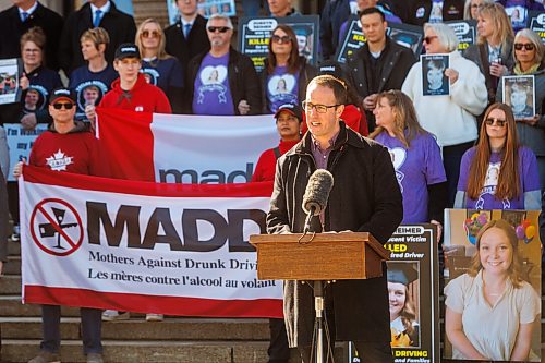 MIKE DEAL / FREE PRESS
MADD Winnipeg president, Trevor Ens, speaks after the procession arrived to the Manitoba Legislative building from steps.
A procession of people affected by drunk driving, including relatives, friends and community supporters, join MADD Winnipeg for a memorial procession from The Forks down Broadway to the Manitoba Legislative building, on the inaugural Victims of Impaired Driving Day in Manitoba.
Reporter: Gabrielle Piche
260501 - Friday, May 01, 2026.