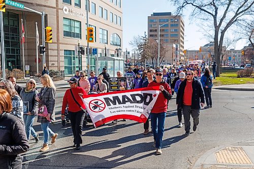 MIKE DEAL / FREE PRESS
A procession of people affected by drunk driving, including relatives, friends and community supporters, join MADD Winnipeg  for a memorial procession from The Forks down Broadway to the Manitoba Legislative building, on the inaugural Victims of Impaired Driving Day in Manitoba. 
Reporter: Gabrielle Piche
260501 - Friday, May 01, 2026.