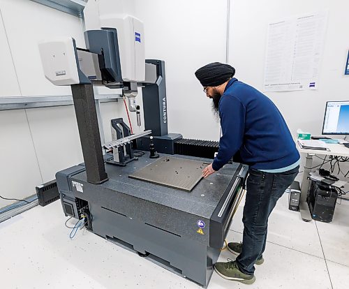 MIKE DEAL / FREE PRESS
Lakhvir Singh, Quality Inspector, at the company’s Zeiss CMM machine. These machines are used to measure complex components for dimensional accuracy.
Precision ADM is a global engineering and manufacturing solutions provider that uses Additive Manufacturing, also known as 3D Printing, as a core technology, complemented by multi-axis machining to manufacture high value components and devices for the medical, aerospace, energy, and industrial sectors.
Reporter: Aaron Epp
260424 - Friday, April 24, 2026.