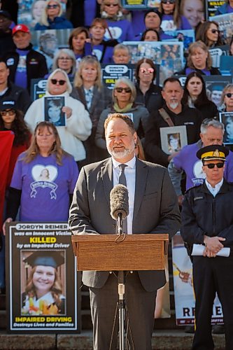 MIKE DEAL / FREE PRESS
Matt Wiebe, Minister of Justice and Attorney General, speaks after the procession arrived to the Manitoba Legislative building from steps.
A procession of people affected by drunk driving, including relatives, friends and community supporters, join MADD Winnipeg for a memorial procession from The Forks down Broadway to the Manitoba Legislative building, on the inaugural Victims of Impaired Driving Day in Manitoba.
Reporter: Gabrielle Piche
260501 - Friday, May 01, 2026.