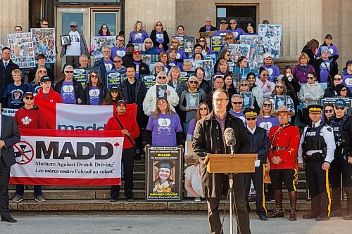 MIKE DEAL / FREE PRESS
MADD Winnipeg president, Trevor Ens, speaks after the procession arrived to the Manitoba Legislative building from steps.
A procession of people affected by drunk driving, including relatives, friends and community supporters, join MADD Winnipeg for a memorial procession from The Forks down Broadway to the Manitoba Legislative building, on the inaugural Victims of Impaired Driving Day in Manitoba.
Reporter: Gabrielle Piche
260501 - Friday, May 01, 2026.