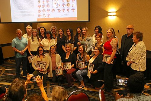 Players from the 1998 to 2003 Westman Magic receive their awards at the 2026 Softball Manitoba Hall of Fame induction at the Victoria Inn on Saturday. (Thomas Friesen/The Brandon Sun)