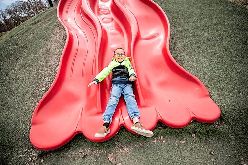 MIKAELA MACKENZIE / FREE PRESS
	
Tatum Genaille, five, plays on a slide at The Forks on Monday, May 11, 2026.

Standup.
Free Press 2026