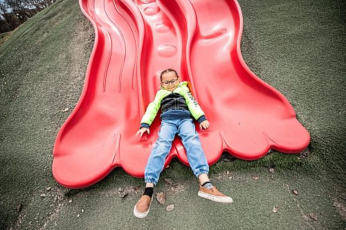 MIKAELA MACKENZIE / FREE PRESS
	
Tatum Genaille, five, plays on a slide at The Forks on Monday, May 11, 2026.

Standup.
Free Press 2026