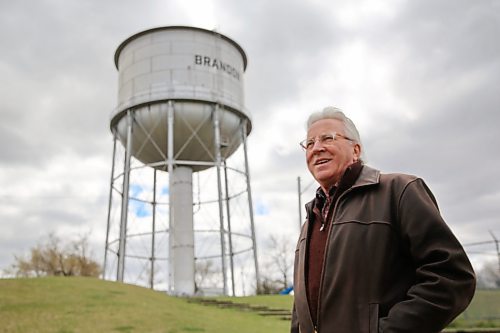Brandon Coun. Glen Parker (Ward 9) stands at Rideau Park on Tuesday. Parker said he would like to see the water tower lit up with blue lights. (Alex Lambert/The Brandon Sun)