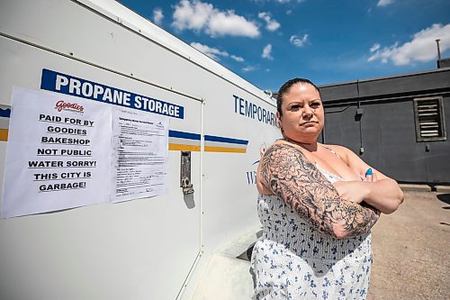 MIKAELA MACKENZIE / FREE PRESS
Linda Peters, owner of Goodies Bake Shop, with the temporary water supply on Friday, May 22, 2026. Theyնe been without water for two days and counting owing to a water main break, and it's causing significant issues for the bakery.
For Malak story.
Free Press 2026