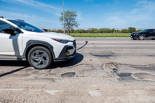 MIKE DEAL / FREE PRESS
Vehicles travel along Kenaston Boulevard between Taylor Avenue and Tuxedo Avenue where potholes and curbs are in bad condition.
CAA Manitoba has released the results of the annual CAA Worst Roads Campaign and Kenaston Boulevard/Route 90 is number three on the list.
Reporter: Nicole Buffie
260528 - Thursday, May 28, 2026.