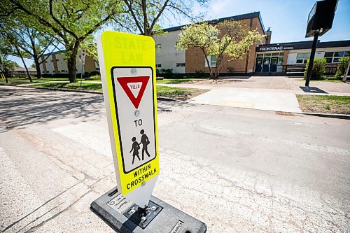 MIKAELA MACKENZIE / FREE PRESS
	
New in-street crosswalk signage in front of Frontenac School on Thursday, May 28, 2026.

For Maggie story.
Free Press 2026