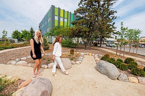 MIKE DEAL / FREE PRESS
Natalie Imbrogno, Director of Health Services – South Winnipeg, and Bria Foster, Executive Director, Health Services – Community Health Services, take a stroll through the ACCESS Fort Garry Therapeutic Garden just before its grand opening ceremony at 135 Plaza Drive Friday. 
Standup
260529 - Friday, May 29, 2026.
