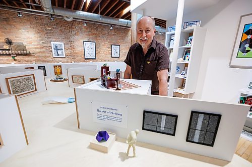 MIKE DEAL / FREE PRESS
Robert peeks over his Miniature K+G gallery which is 1/12th scale and includes a 3D printed model of Robert looking at his art.
Robert Pasternak whose show, The Art of Noticing, has been on display at the Katie and Gunner Gallery for most of May and has been extended into June.
Reporter: Jen Zoratti
260529 - Friday, May 29, 2026.