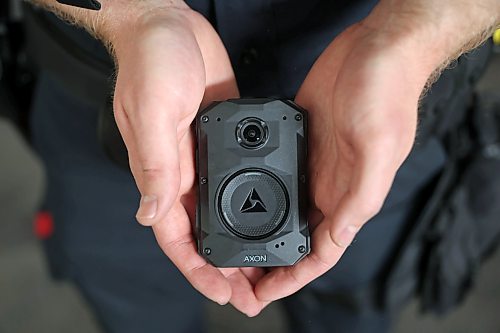 01062026
Constable Gary Sheane with the Brandon Police Service holds a body-worn video camera during a press event at BPS Headquarters on Victoria Avenue on Monday. BPS is beginning the implementation of the cameras for approximately 65 officers.
(Tim Smith/The Brandon Sun)