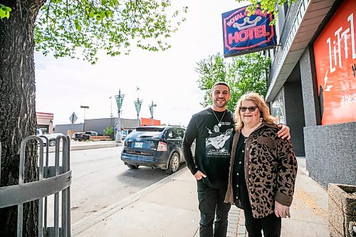 MIKAELA MACKENZIE / FREE PRESS
	
Jared and Teresa Pester, son and wife (respectively) of the late musician Gregg Pester, outside of the Royal George Hotel on Wednesday, June 3, 2026. The city is considering renaming this block of Regent Avenue to honour the hotel owner country musician.

For Tiago (intern) story.
Free Press 2026
