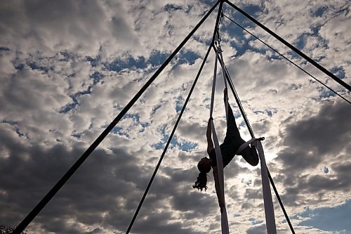 03062026
Kris Mac with Elevation Entertainment performs an aerial silks routine for fair-goers on the opening day of the Manitoba Summer Fair at the Keystone Centre grounds on Wednesday. The fair runs until Sunday. 
(Tim Smith/The Brandon Sun)