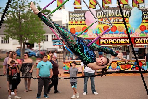 03062026
Kris Mac with Elevation Entertainment performs an aerial cube routine for fair-goers on the opening day of the Manitoba Summer Fair at the Keystone Centre grounds on Wednesday. The fair runs until Sunday. 
(Tim Smith/The Brandon Sun)