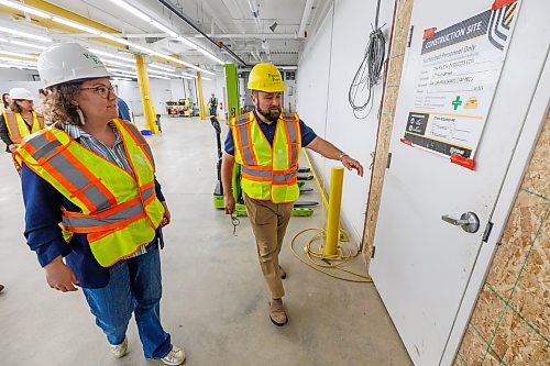 MIKE DEAL / FREE PRESS
Vince Barletta, CEO of Harvest Manitoba takes Rebecca Alty, Minister of Crown-Indigenous Relations on a tour of the construction site for the Asihcikan Project.
Rebecca Alty, Minister of Crown-Indigenous Relations, gets a tour of the Asihcikan Project at 567 Notre Dame Avenue before making an announcement regarding the start of the grocery benefit payments program.
The Asihcikan Project is a $14-million Indigenous-led community hub and grocery-style food bank in central Winnipeg. Located at 563-567 Notre Dame Avenue, the 30,000-square-foot space was created by the Ma Mawi Wi Chi Itata Centre and Harvest Manitoba.
Reporter: Morgan Modjeski
260605 - Friday, June 05, 2026.