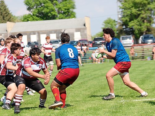A wall of St. Paul's defenders line up as Souris' Mackenzie Monias prepares to attack. (Massimo De Luca-Taronno/The Brandon Sun)