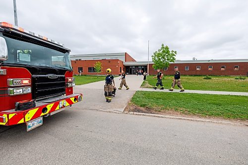 MIKE DEAL / FREE PRESS
WFPS crews at Sisler High School Friday morning because of a mechanical issue. Students headed home and a school administrator confirmed school was closed for the day.
260605 - Friday, June 05, 2026.