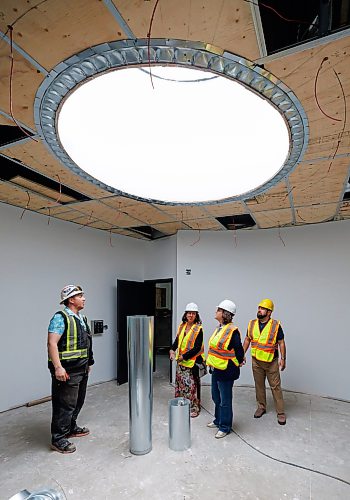 MIKE DEAL / FREE PRESS
(From left) James Campbell, site superintendent for Parkwest Projects Ltd, talks to Rachel Sansregret, CEO of the Winnipeg Indigenous Friendship Centre, Rebecca Alty, Minister of Crown-Indigenous Relations, and Vince Barletta, CEO of Harvest Manitoba, while on a tour of the construction site for the Asihcikan Project.
Rebecca Alty, Minister of Crown-Indigenous Relations, gets a tour of the Asihcikan Project at 567 Notre Dame Avenue before making an announcement regarding the start of the grocery benefit payments program.
The Asihcikan Project is a $14-million Indigenous-led community hub and grocery-style food bank in central Winnipeg. Located at 563-567 Notre Dame Avenue, the 30,000-square-foot space was created by the Ma Mawi Wi Chi Itata Centre and Harvest Manitoba.
Reporter: Morgan Modjeski
260605 - Friday, June 05, 2026.
