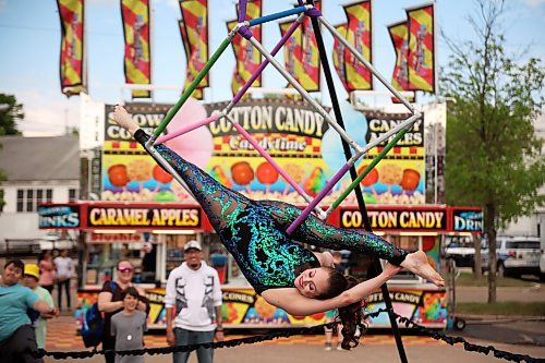 03062026
Kris Mac with Elevation Entertainment performs an aerial cube routine for fair-goers on the opening day of the Manitoba Summer Fair at the Keystone Centre grounds on Wednesday. The fair runs until Sunday.
(Tim Smith/The Brandon Sun)
