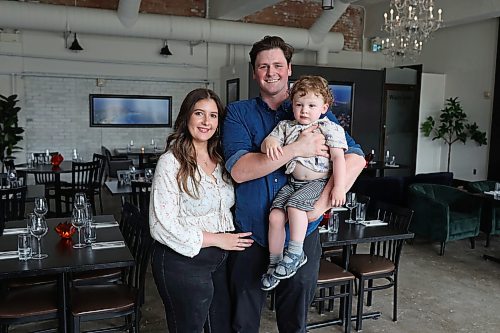 09062026
Juliana and Riley Bernier, co-owners of Hermanos Firehall, with their son Christopher, in the steakhouse on Princess Avenue on Friday. The steakhouse opens on June 18th. 
(Tim Smith/The Brandon Sun)