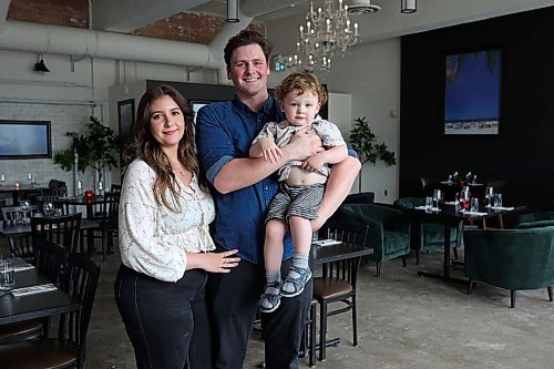 09062026
Juliana and Riley Bernier, co-owners of Hermanos Firehall, with their son Christopher, in the steakhouse on Princess Avenue on Friday. The steakhouse opens on June 18th.
(Tim Smith/The Brandon Sun)
