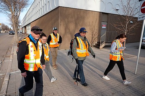Brandon Bear Clan members patrol Princess Avenue in downtown Brandon, handing out food, water and clothing and offering help to those in need within the downtown core. (Tim Smith/The Brandon Sun files)
