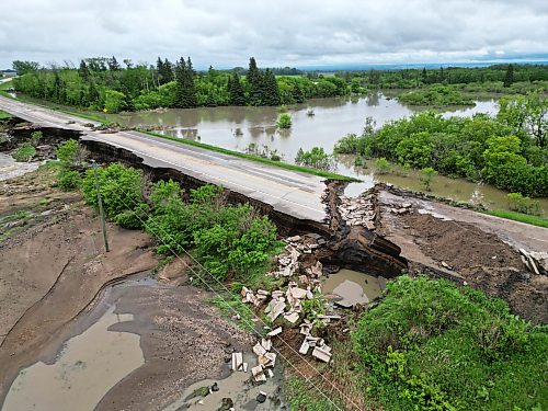 10062026
Damage to Highway 10 at Tamarack Creek just east of Swan River, Manitoba is visible on Wednesday after intense rainfall this week caused the river to swell and damaged the highway. The province cut a section of Highway 10 at the creek to relieve some of the pressure from the swollen creek.
(Tim Smith/The Brandon Sun)