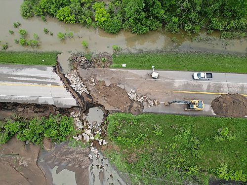 10062026
Damage to Highway 10 at Tamarack Creek just east of Swan River, Manitoba is visible on Wednesday after intense rainfall this week caused the river to swell and damaged the highway. The province cut a section of Highway 10 at the creek to relieve some of the pressure from the swollen creek.
(Tim Smith/The Brandon Sun)