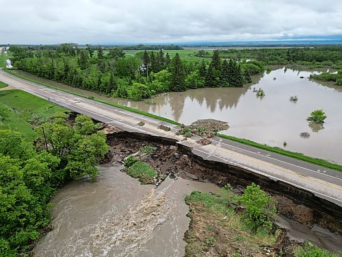 10062026
Damage to Highway 10 at Tamarack Creek just east of Swan River, Manitoba is visible on Wednesday after intense rainfall this week caused the river to swell and damaged the highway. The province cut a section of Highway 10 at the creek to relieve some of the pressure from the swollen creek.
(Tim Smith/The Brandon Sun)