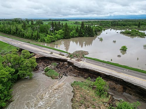 10062026
Damage to Highway 10 at Tamarack Creek just east of Swan River, Manitoba is visible on Wednesday after intense rainfall this week caused the river to swell and damaged the highway. The province cut a section of Highway 10 at the creek to relieve some of the pressure from the swollen creek.
(Tim Smith/The Brandon Sun)