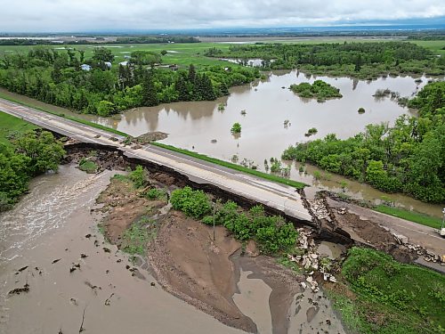 10062026
Damage to Highway 10 at Tamarack Creek just east of Swan River, Manitoba is visible on Wednesday after intense rainfall this week caused the river to swell and damaged the highway. The province cut a section of Highway 10 at the creek to relieve some of the pressure from the swollen creek. 
(Tim Smith/The Brandon Sun)
