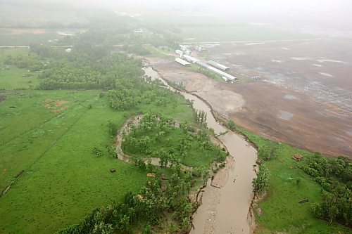 10062026
A swollen creek between Minitonas and Swan River, Manitoba is visible from a helicopter during rain on Wednesday after intense rainfall this week caused widespread flooding in the region. Manitoba Premier Wab Kinew toured the affected areas Wednesday.
(Tim Smith/The Brandon Sun)