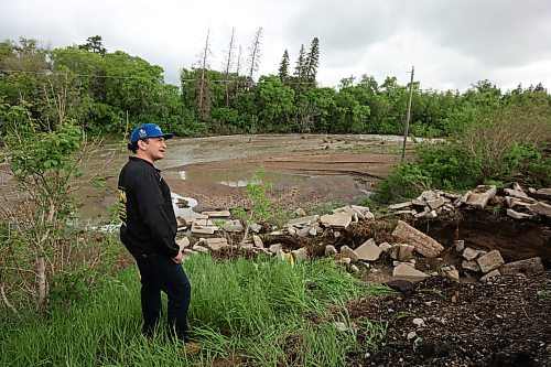 10062026
Manitoba Premier Wab Kinew tours damage to Highway 10 at Tamarack Creek just east of Swan River, Manitoba on Wednesday after intense rainfall this week caused the river to swell and damaged the highway. The province cut a section of Highway 10 at the creek to relieve some of the pressure from the swollen creek.
(Tim Smith/The Brandon Sun)